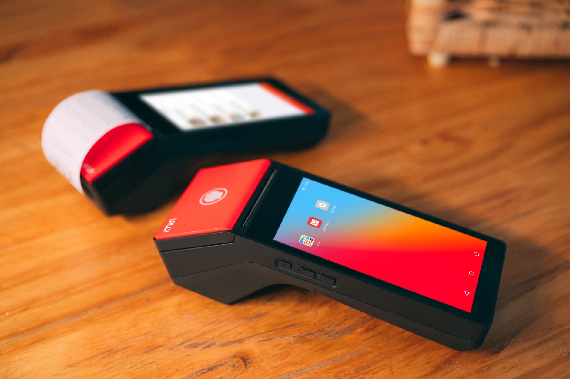 POS机进件是什么意思:Close-up of two modern cashless payment terminal POS机进件是什么意思:Close-up of two modern cashless payment terminal